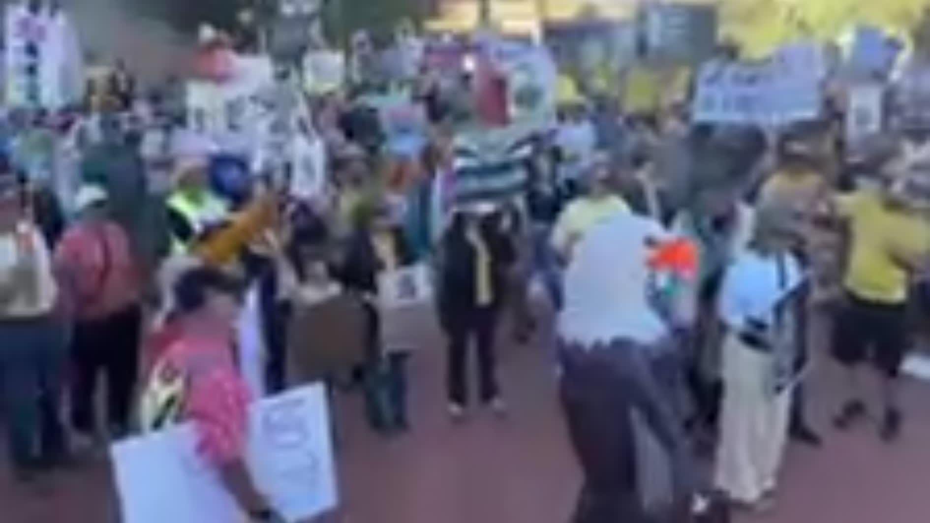 Adelita Grijalva greets protestors as they chant swear her in at the No Kings protest in downtown Tucson.